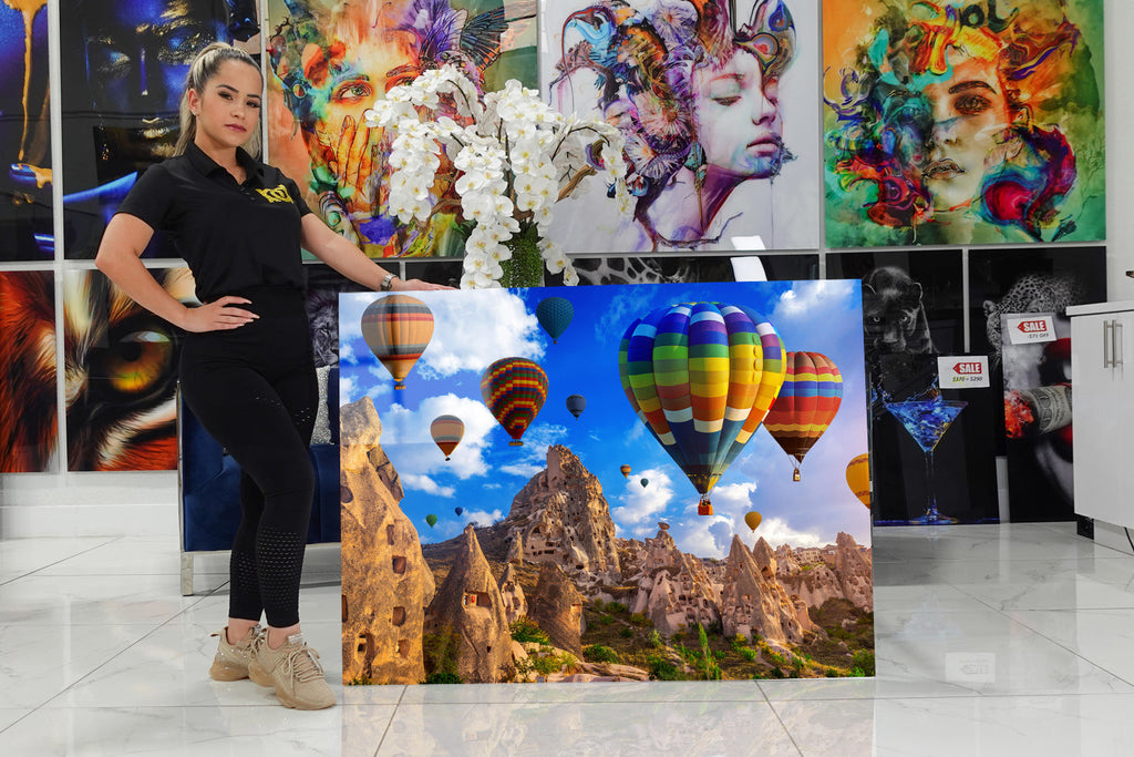 Acrylic with hot air balloons and a breathtaking landscape.