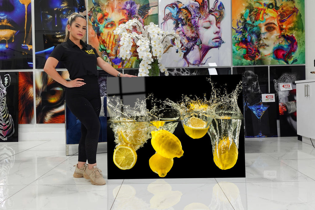 Acrylic design of lemons falling quickly into the water.