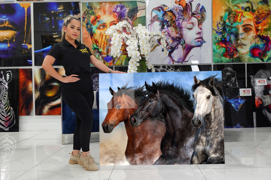 Acrylic with horses running at high speed.
