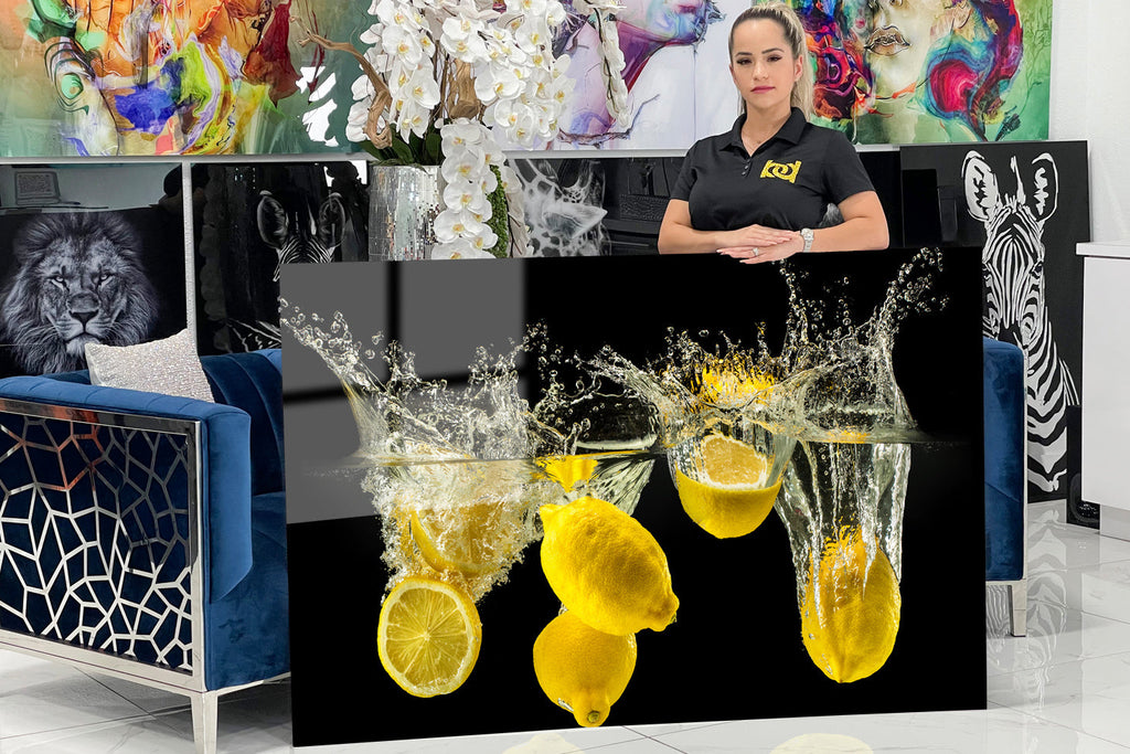 Acrylic design of lemons falling quickly into the water.
