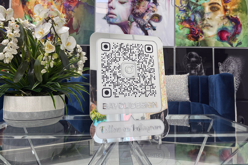 Elegant acrylic design with QR code for business.